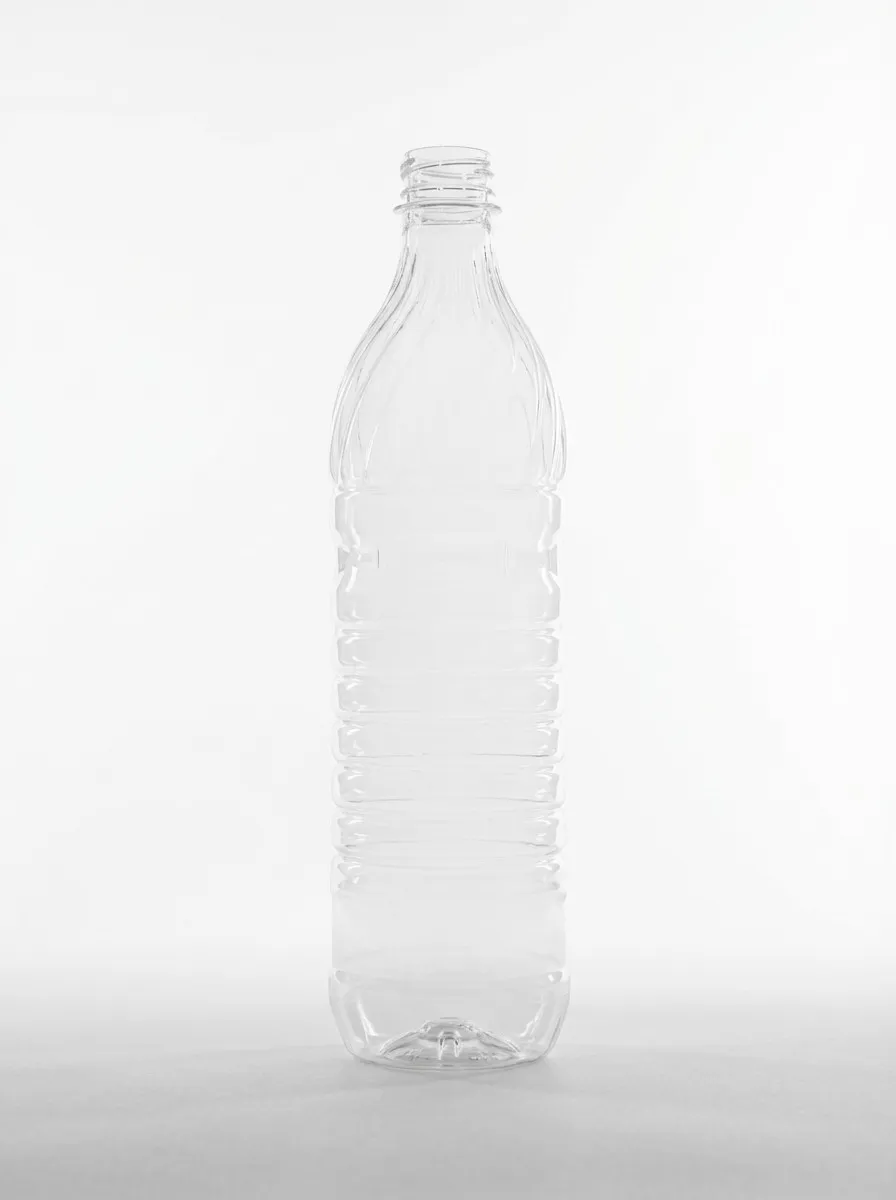 Clear PET bottle with fluted shoulder and ridged body
